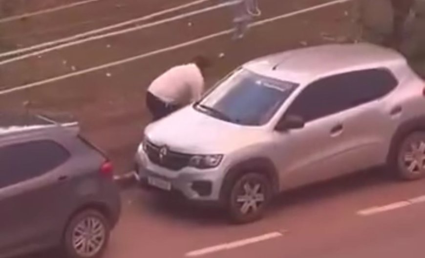 VÍDEO - Motorista é flagrado furtando estepe de veículo estacionado no Carnaval de Porto Velho